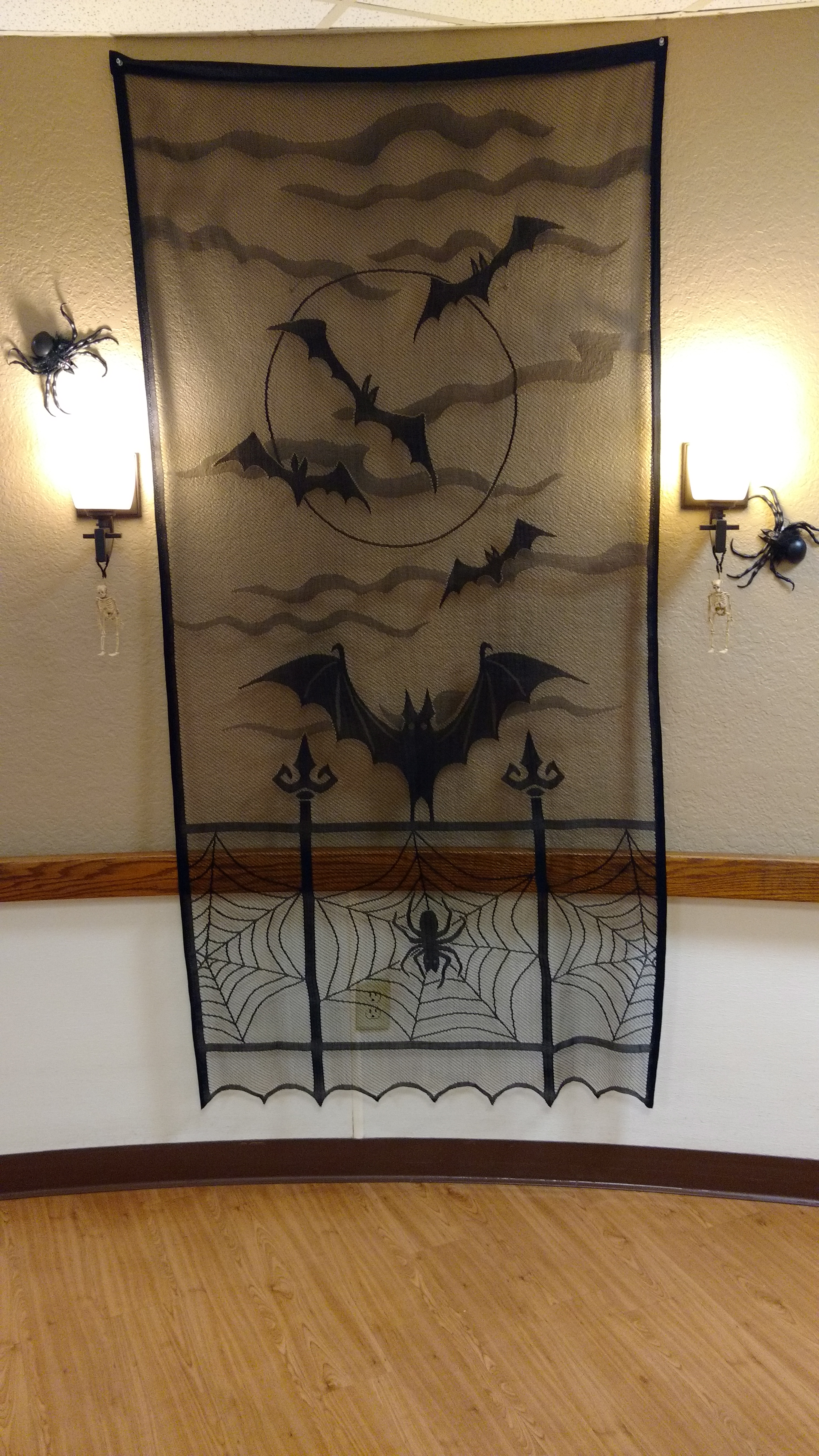 bats and spiders decoration hanging on wall